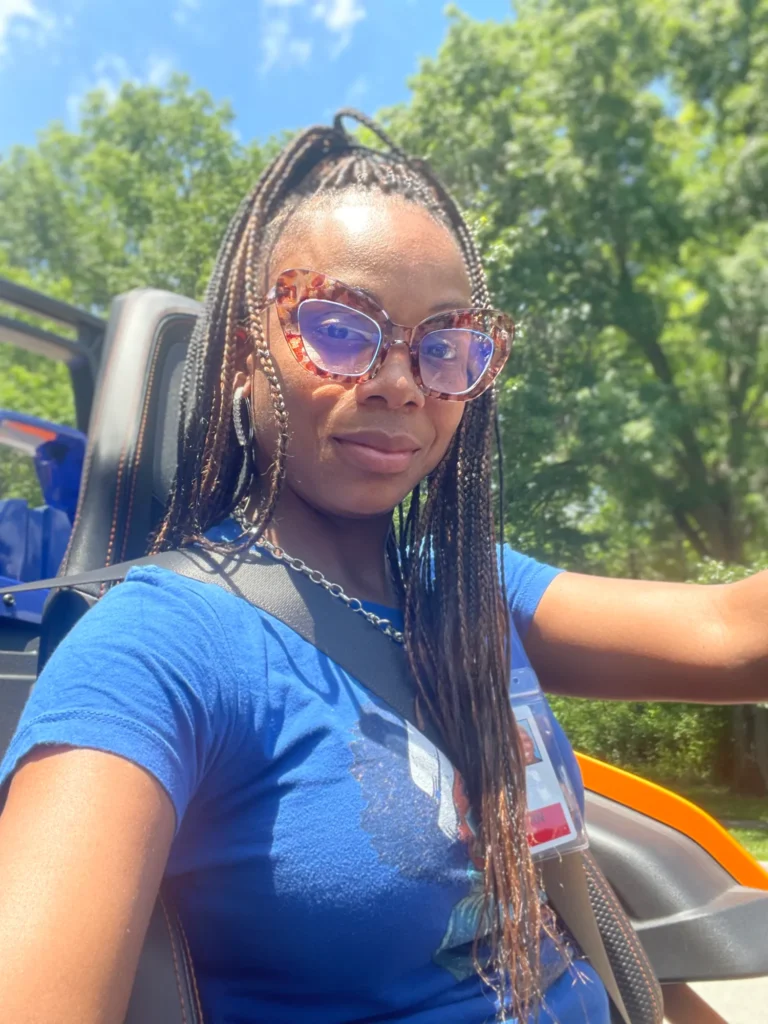 Client outdoors with long black box braids — Box Braids